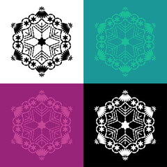 Set of 4 embroidered snowflakes.