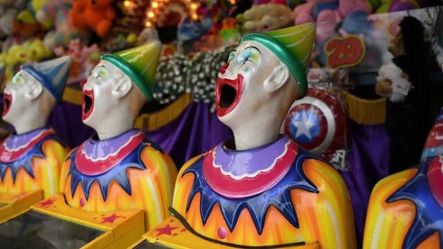 A row of laughing clown faces