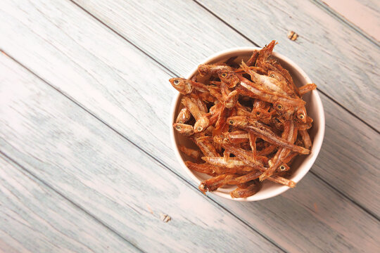  Dried Indian anchovies fish on bowl 