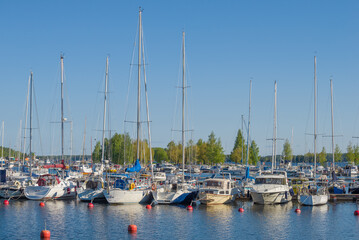 Fototapeta na wymiar Anchorage of yachts on Lake Saimaa on a sunny June day. Finland