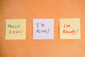 Motivational text on sticky notes, new year 2021 resolution concept 