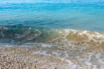 Sea waves on the pebble beach