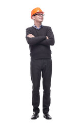Handsome young man with protective helmet on his head and arms crossed