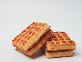 Traditional Belgian waffles isolated on white background, top view