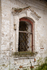 Fototapeta na wymiar window of an abandoned old Church