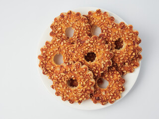 tea biscuits, oatmeal cookies, oatmeal cookies on a white background, confectionery, bakery products