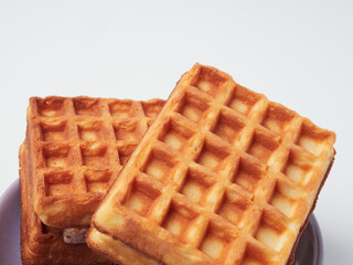 Traditional Belgian waffles isolated on white background, top view