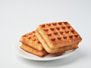Traditional Belgian waffles isolated on white background, top view