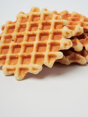 Traditional Belgian waffles isolated on white background, top view