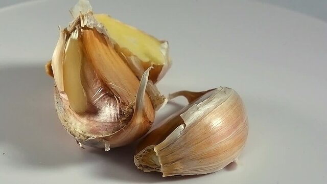 garlic on a white background, rotating
