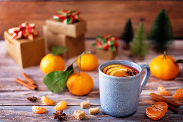 Mulled wine with oranges and anise in a cup