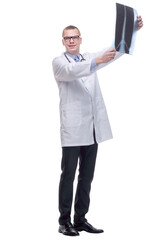 Front view of a doctor with stethoscope studying x-ray image