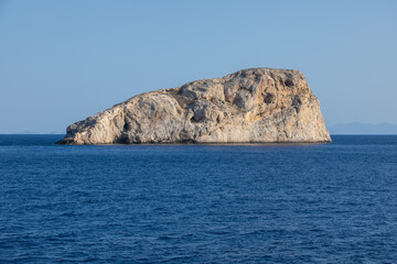 Fototapeta na wymiar Rock island on Aegean Sea. Greece.