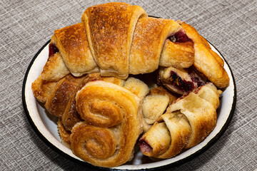 Dessert croissants and ears with jam handmade