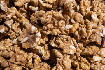 Texture of delicious walnuts without shell in the market, nut background
