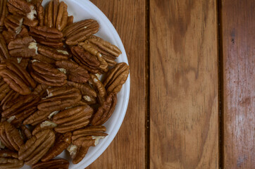 peeled pecan nuts on a plate