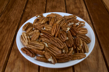 peeled pecan nuts on a plate