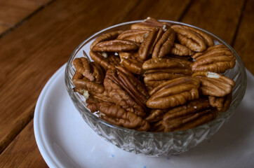 peeled pecan nuts on a bol