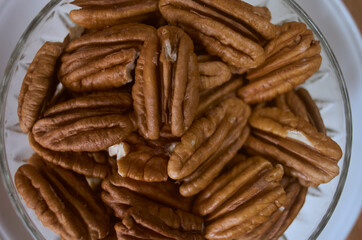 peeled pecan nuts on a bol