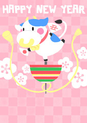 駒の上で踊る牛の年賀状イラスト