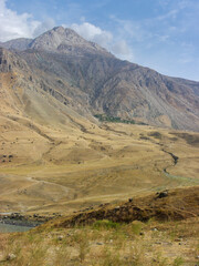 Beautiful view of Panj river valley border between Tajikistan and Afghanistan in Darvaz district, Gorno-Badakshan, Pamir mountain region of Tajikistan