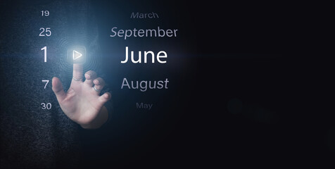 June 1st . Day 1 of month, Calendar date. Hand click luminous icon PLAY and DATE on dark blue background. Summer month, day of the year concept.
