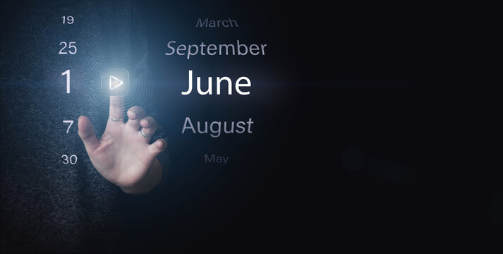 June 1st . Day 1 of month, Calendar date. Hand click luminous icon PLAY and DATE on dark blue background. Summer month, day of the year concept.
