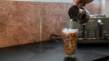 ice coffee latte put on black table