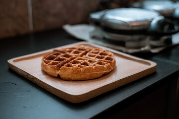 pan waffles on wooden plate