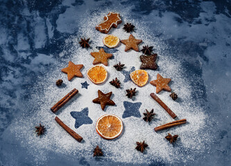 Collection of various christmas cookies with dried orange slices