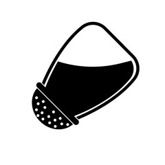 pour salt from salt shaker. Baking and cooking ingredient.