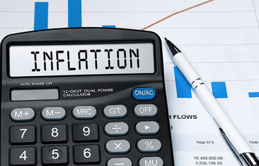 Calculator with the word INFLATION on the display