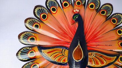 bamboo made wooden peacock in a white isolated background