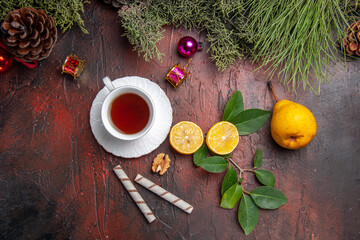 top view cup of tea with fruits on dark background fruit tea photo dark