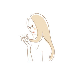 傷んだ髪に悩む女性