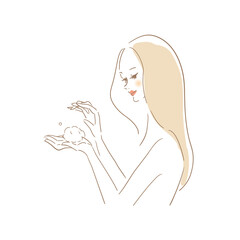 ヘアケアする美しい女性