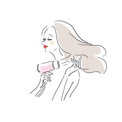 髪を乾かす女性