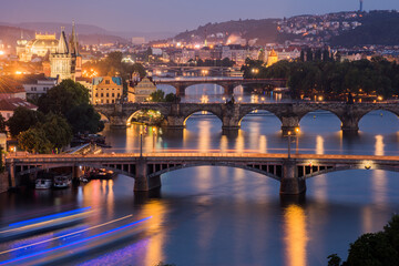 Fototapeta na wymiar Vltava River and Prague cityscape at sunset.