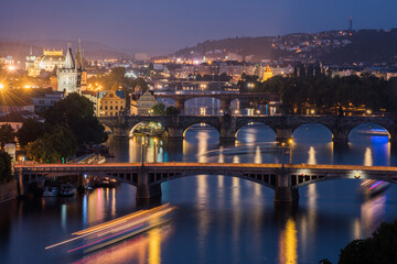 Fototapeta na wymiar Vltava River and Prague cityscape at sunset.