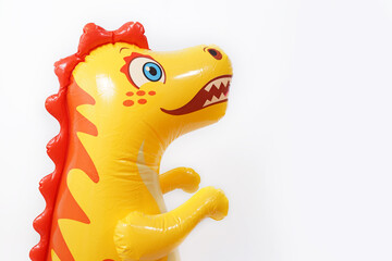 Cute dinosaur toy tumbler isolated on white