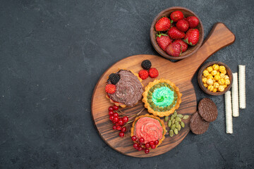 top view delicious creamy cakes with fruits on dark background sweet biscuit cookie