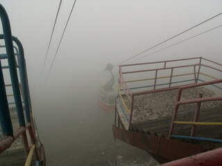 chairlift in fog
