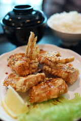 Deep-fried salmon belly garnish with vegetable, Japanese cuisine