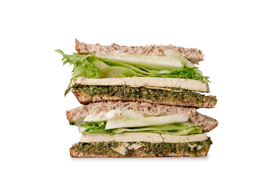 Healthy sandwitch with lettuce, avocado and tofu, isolated.
