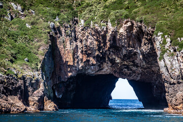 arch cave through an island