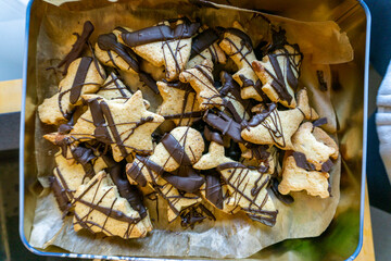 christmas cookies cutters on the table; recipe biscuit;  decorating holiday biscuits