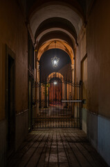 Fototapeta premium Old palace entrance in Milan by night