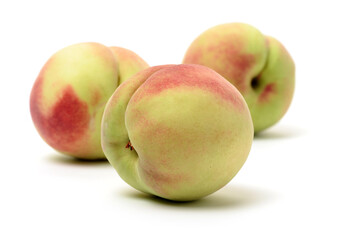 ripe peach on white background