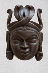 Wooden mask of sane Goddess Manasha