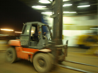 a forklift while working on a ship © Marco